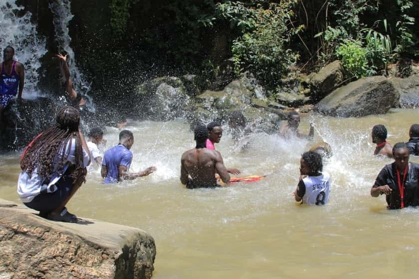 people standing in water