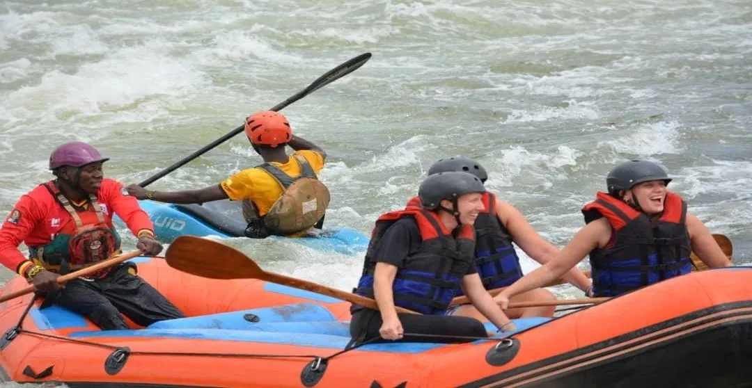 people on boat water rafting