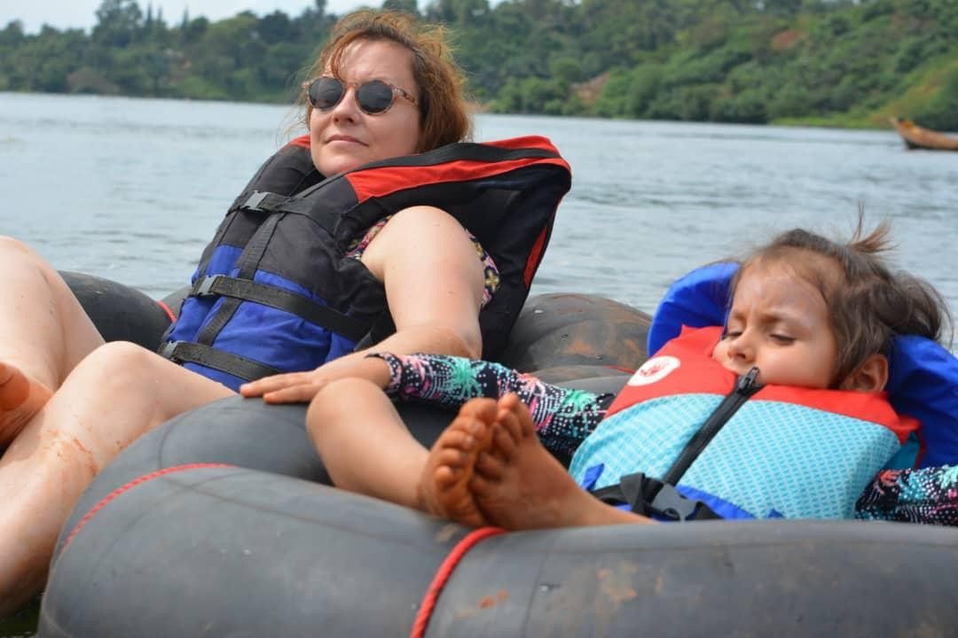a woman and a child on floaters