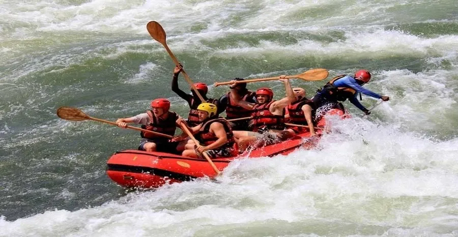 people a boat water rafting